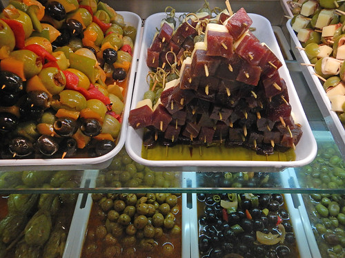Deli with olive tidbits for sale at Mercado San Miguel in Madrid, Spain
