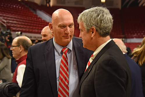 New athletics director Boo Corrigan (right) chats with retired four-star United States Army general and NC State alumnus Ray Odierno.
