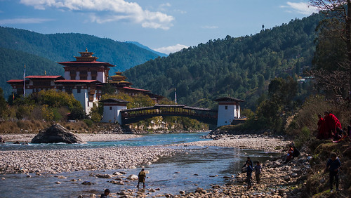 bhutan punakha dzong fortress asia monastery monks landscape river forest nature