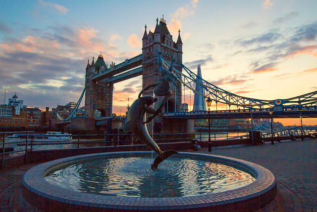 The Bridge and Statue at Sunset
