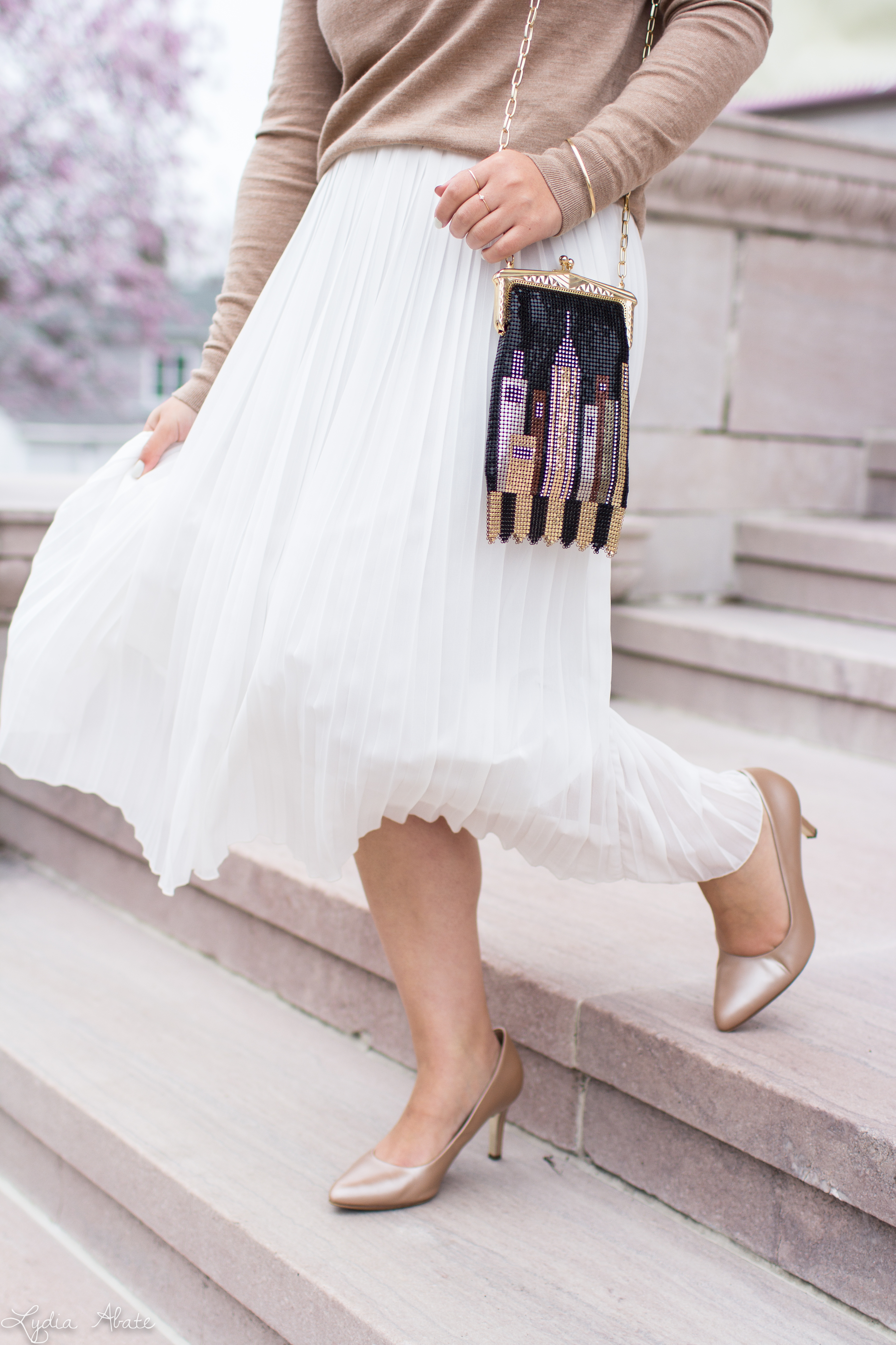 white pleated skirt, camel turtleneck, whiting and davis skyline bag-7.jpg