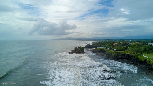 aerial aerialshot aerialview droneshot sea shore seashore ocean openwater horizon sky clouds rainingseason wetseason wind storm windy outdoor outdoors watersports maritime blue bali indonesia travel tourism holidays vacation water color sunny day watertemple tanahloth waves foam foamy