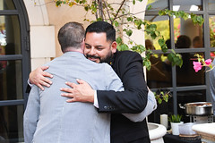 two men embrace at the 2018 festival reception
