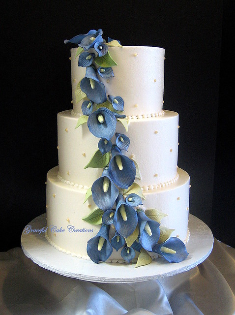 Elegant Ivory Wedding Cake with Blue Calla Lilies