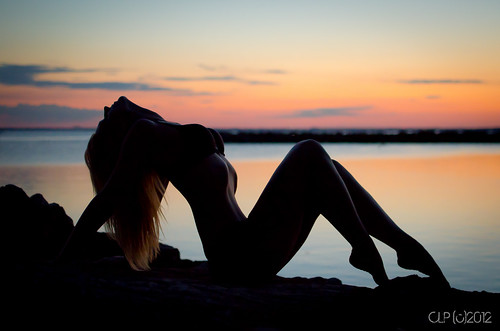 sunset woman sexy water girl beauty silhouette rocks legs bra bikini blonde reclined