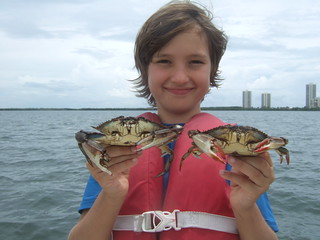 Beau with some big blue crabs.