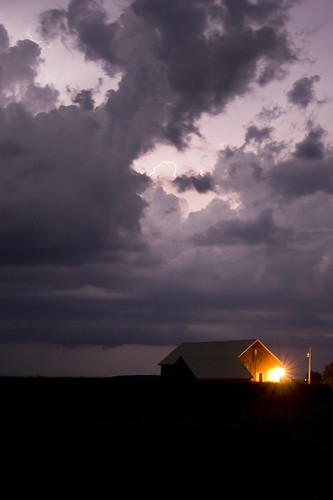 Electric Light by Painted Light Studio, Lightning removes the darkness from the night sky above a barn.light summer usa storm nature field w