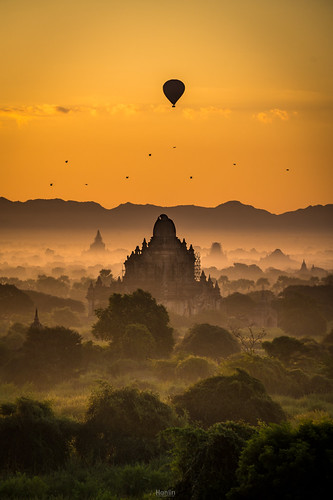 Misty Morning Sunrise at Myanmar. by tehhanlin, A very beautiful sunrise layer of mist rises across the Bagan in the early morning and creating a my