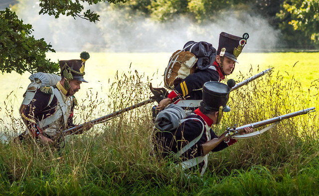 A reenactment at Romsey in Hampshire of French soldiers during a skirmish in the Napoleonic wars