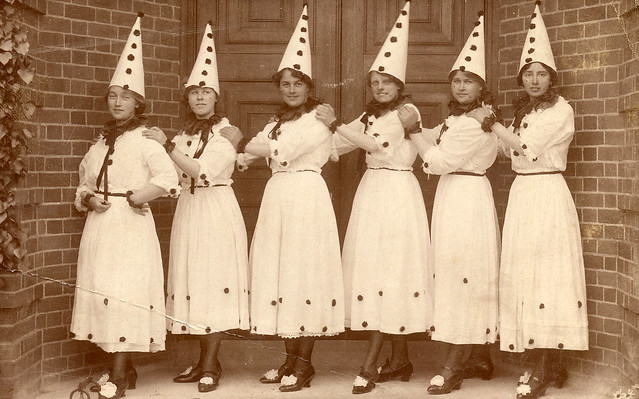 Six young women dressed up as pierrots