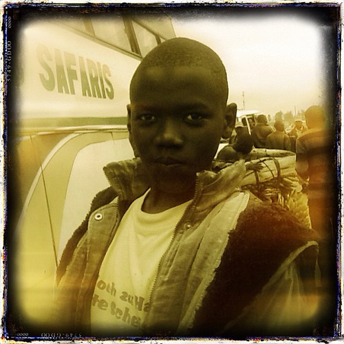 boy portrait water square tanzania border squareformat uganda seller bukoba iphoneography instagramapp uploaded:by=instagram foursquare:venue=4e0b03ebd4c091ae45d78dab bf:blogitem=5411