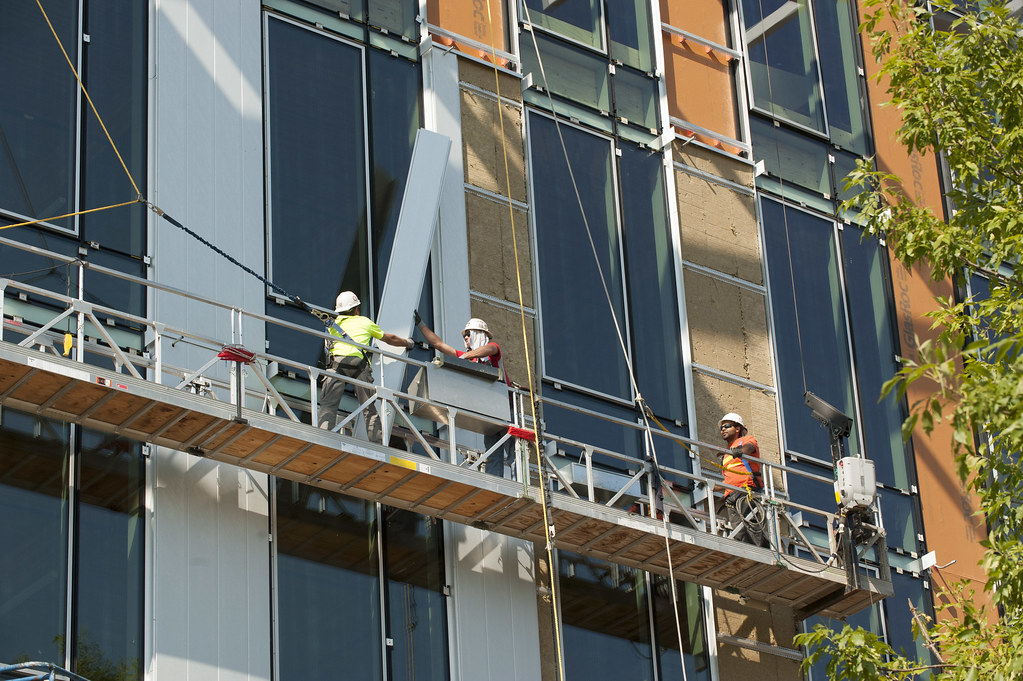 Siding Job Workers install siding (See: http://www.flickr.com/photos/… | Flickr