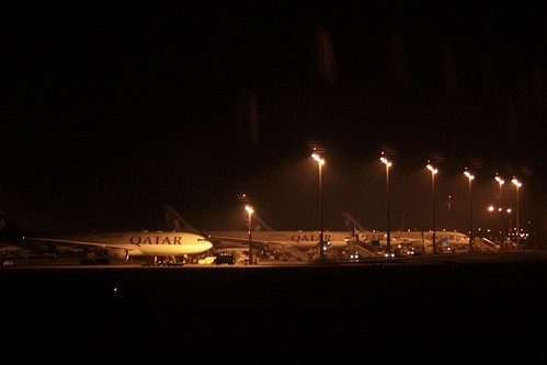 Row of Qatar Airways jets on the eastern apron at Doha