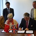 Signing the MOU setting up the UK-Shandong Business Group, watched by Sir David Brewer, Chairman, CBBC and Director Xia of the Shandong Investment Bureau
