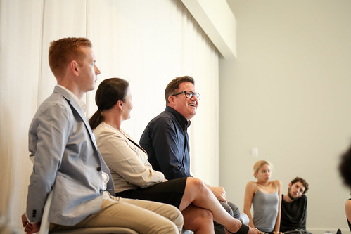 Choreographer Sir Matthew Bourne and Re:Bourne's executive director James Mackenzie-Blackman watch a studio showing and participate in a discussion with BFA students, moderated by Vice Dean Jodie Gates.