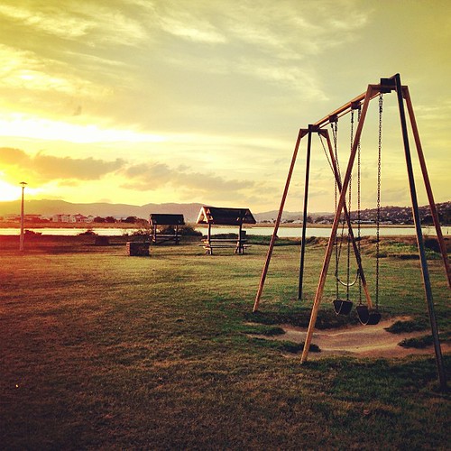 africa park sunset summer sun grass clouds square southafrica fun evening town twilight play view over grow games swing seats squareformat end rise iphoneography instagramapp uploaded:by=instagram