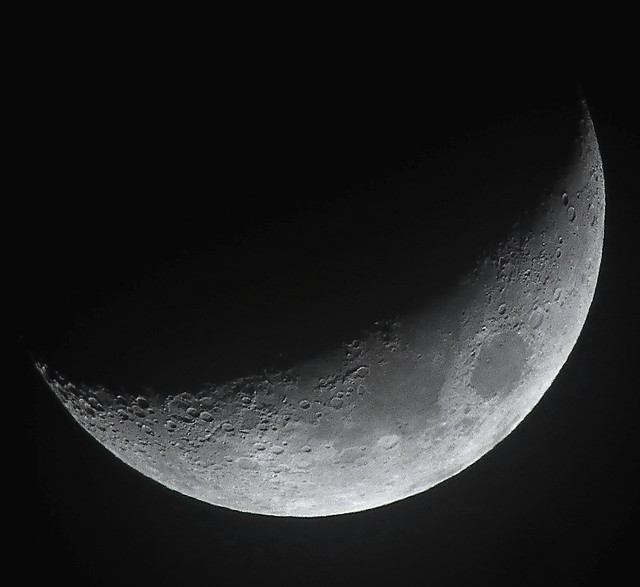 Waxing Crescent, 28% of the Moon is Illuminated taken on a mostly cloudy December 17, 2012 with a FUJI HS10 using a 1.7x teleconversion lens JPEG DSCF1553
