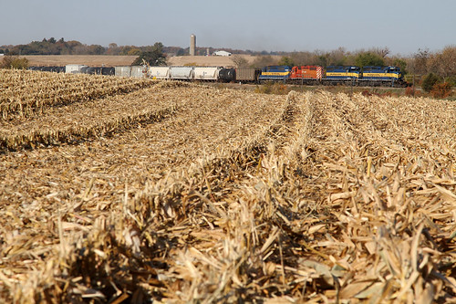 Crusin' Toward Lanark by M. Lastovich, Iowa, Chicago & Eastern 6410 and fellow SD tasties brighten up the freshly plowed cornfields of 