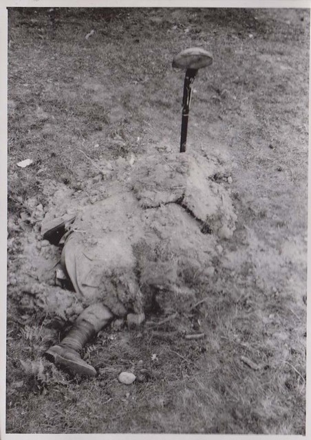 War is Hell -Russian Soldier buried in makeshift way