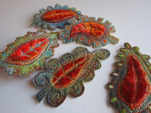 Amber brooches
