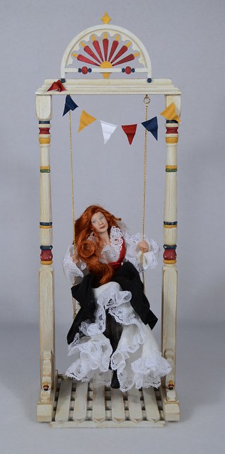 Porcelain Lady Doll on County Fair Swing