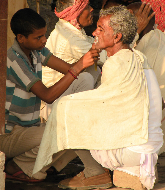 A shave on the ghat