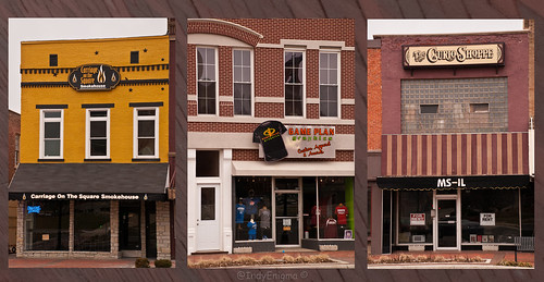 door white brick sign yellow retail facade awning triptych indiana sidewalk storefront smalltown forrent courthousesquare