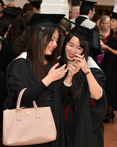 Graduands taking pictures before the ceremony