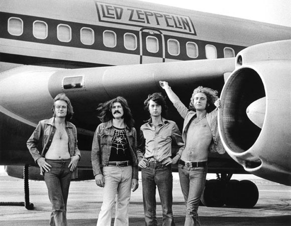 Led Zeppelin & their private plane Starship by Bob Gruen 1973