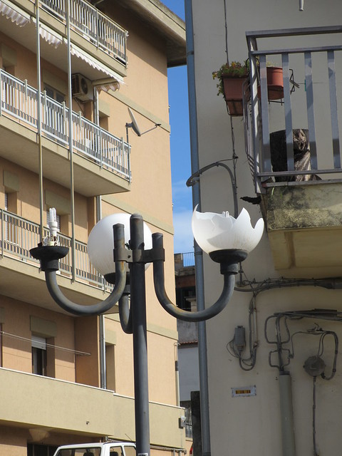 Broken street lamp, Noto, Italy