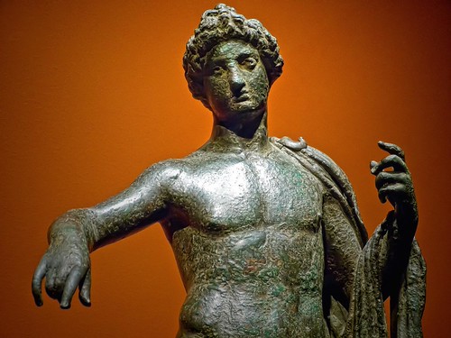 Closeup of Apollo with elaborate hairstyle in a strong con… | Flickr