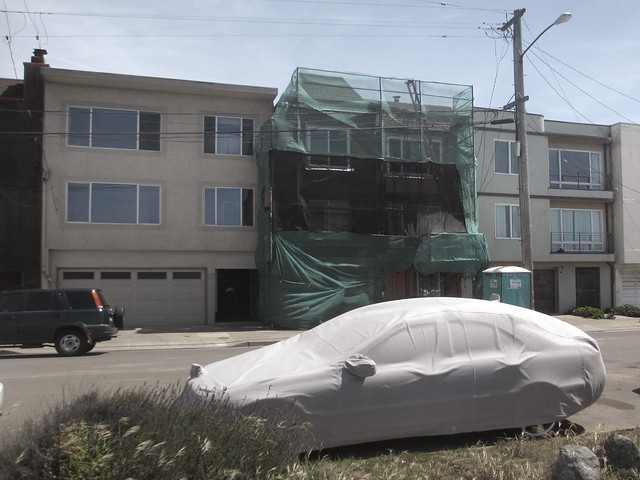 covered car and house construction on Great Highway; The Sunset, San Francisco. April 13, 2013