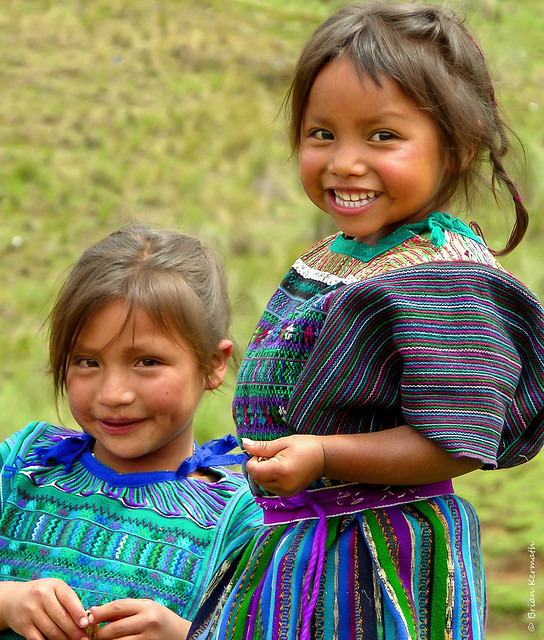 Two young girls at a dedication ceremony for a new school in a rural village