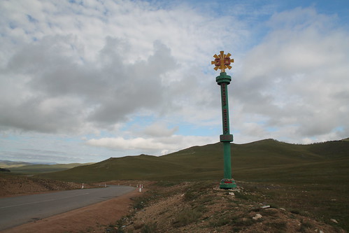 mongolia road pass sign monument mountain steppe grassland