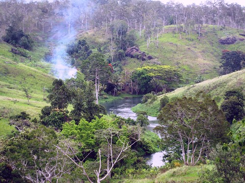 trees water river countryside nationalpark smoke burning papuanewguinea portmoresby
