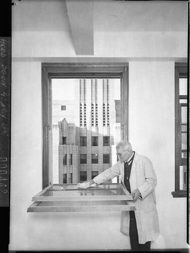 A.P.A. Building. The inventor demonstrates the detail of a new steel frame demountable window for cleaning, Nov. 1937, by Sam Hood | by State Library of NSW