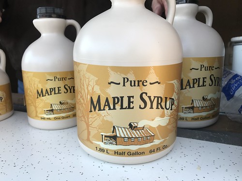 Photo of several bottles of pure maple syrup