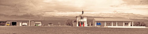 road blue panorama orange yellow sepia buildings landscape route66 pano structures gasstation scape selectivecolor vechiles sighposts