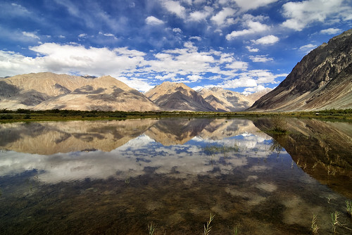 reflections reflection himalayas mountains mountainsnap diskit disket clouds mirror water waterbody clearwater ladakh nubra nubravalley incredibleindia incrediblehimalayas incrediblenubra shadows travel travelindia travelinindianhimalayas travelinhimalayas roadtriptoladakh detail downisupupisdown godisindetails landscape landscapes