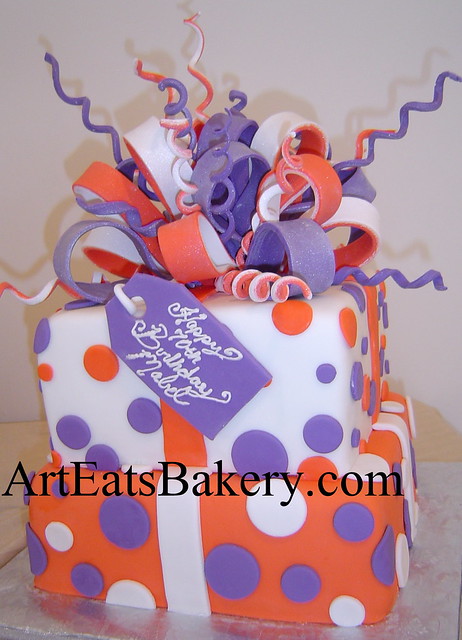 Two tier square Clemson orange, purple and white present design 70th birthday cake with large sugar bow