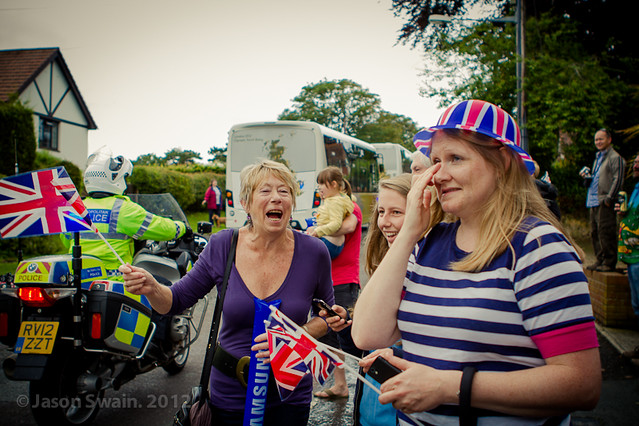 The 2012 Olympic Torch Relay at Church Hill, Totland, Isle of Wight.