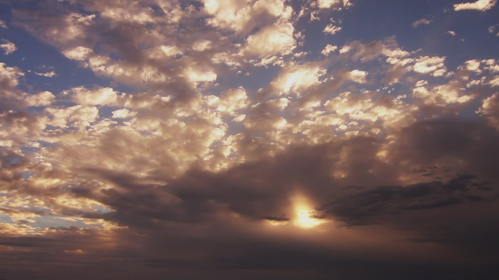 Free HD stock video - time lapse clouds with sun rays | Flickr