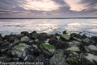 Sunset at Hoek van Bant at decreasing tide