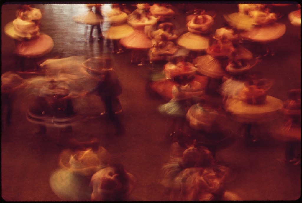 Skirts whirl in the 33rd Annual Square Dance Festival, held in Pershing Auditorium, May 1973