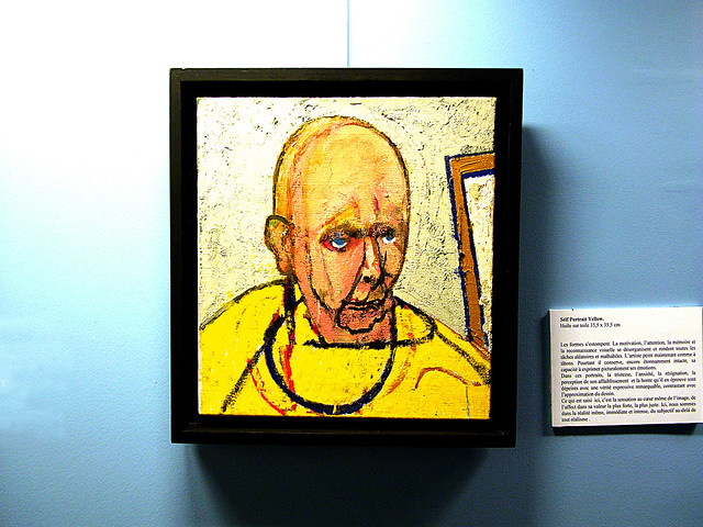 William Utermohlen. Self portrait in yellow. Alzheimer's disease effects.