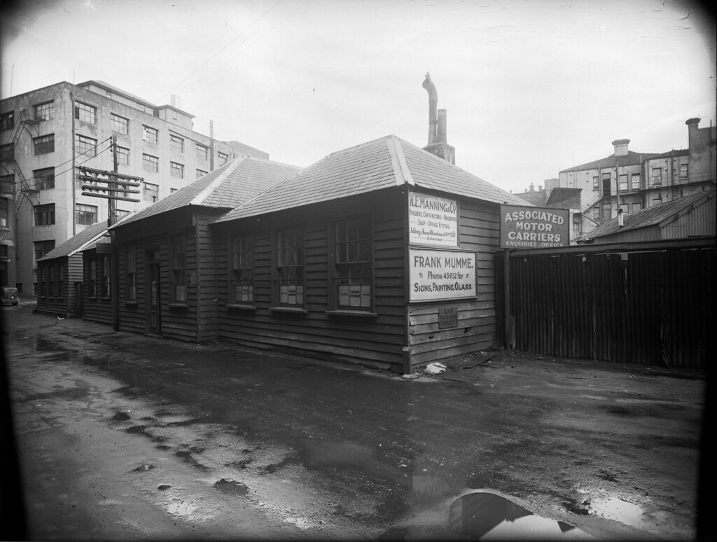 14; Frank Mumme, commercial premises - Circa 1900 - a black and white photo of a building