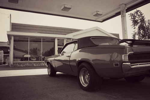auto old wild summer bw white black classic 1969 car station sepia cat vintage us highway automobile view mercury muscle weekend michigan rear north kitty september gas chrome american storefront americana service former 1970 roadside standard northern cougar tone laborday 2012 spoiler 131 amoco ponycar threequarter worldcars