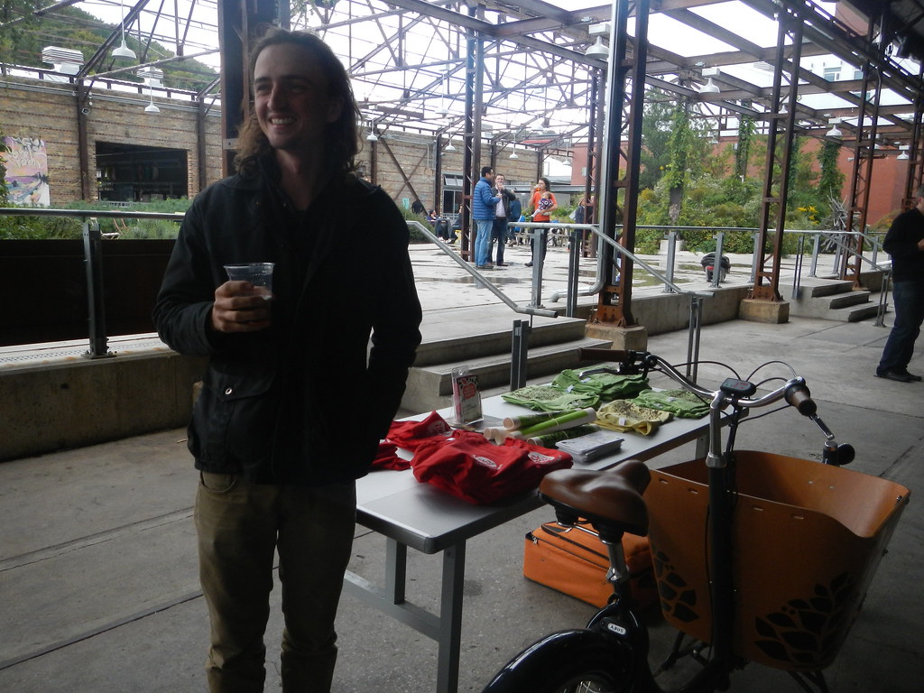 A tough life: Paul enjoys Sumac beer while showing off our shiny merch