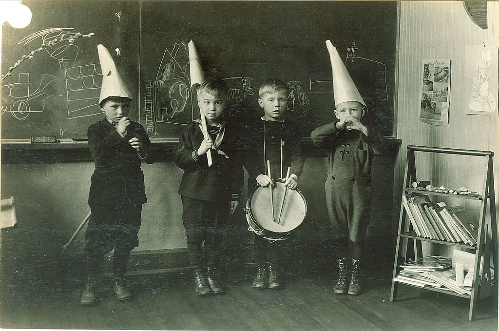 Boys pretending to play musical instruments, The Universit… | Flickr