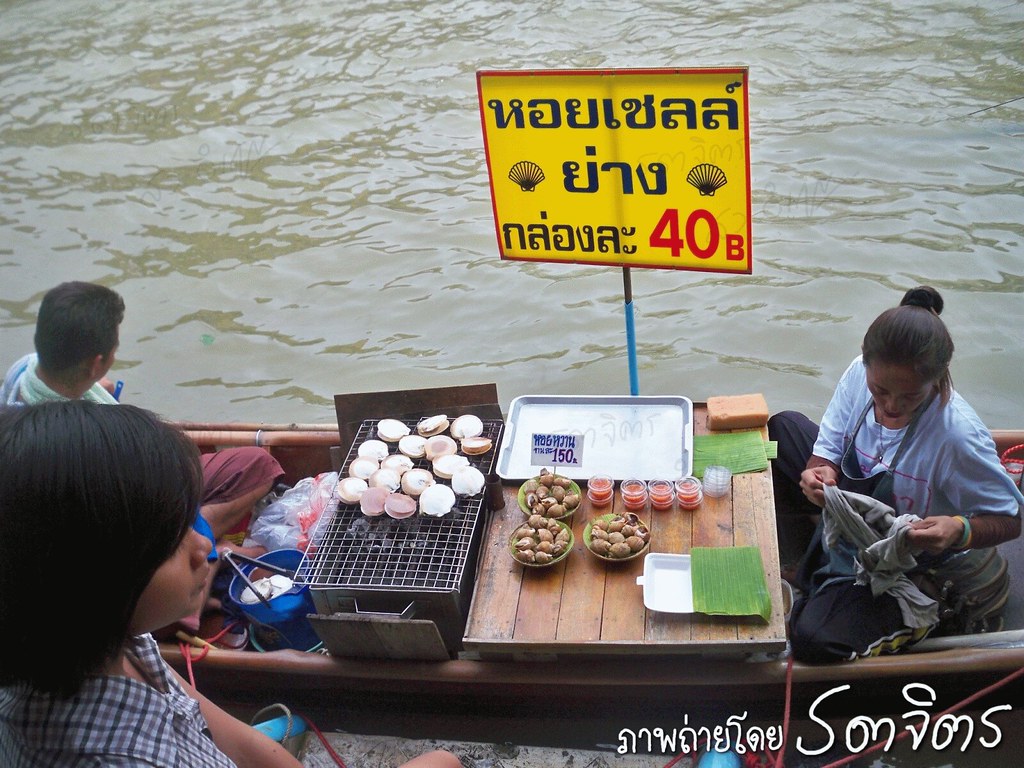 Thai floating market riverside local people and folk visitor places to visit tourism attraction